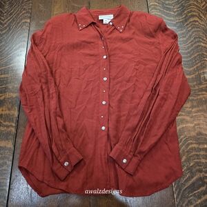 Women's rust-colored, long-sleeve, collared button-down blouse